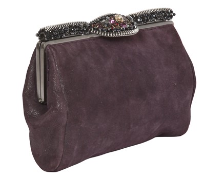 Lot 62 - A Chanel by Karl Lagerfeld purple suede evening clutch, early 2000s