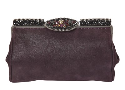 Lot 62 - A Chanel by Karl Lagerfeld purple suede evening clutch, early 2000s