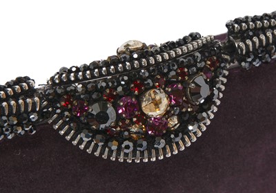 Lot 62 - A Chanel by Karl Lagerfeld purple suede evening clutch, early 2000s
