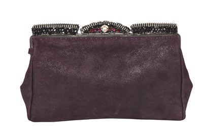 Lot 62 - A Chanel by Karl Lagerfeld purple suede evening clutch, early 2000s