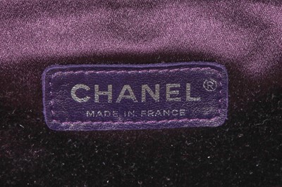 Lot 62 - A Chanel by Karl Lagerfeld purple suede evening clutch, early 2000s