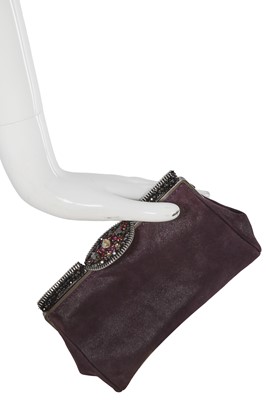 Lot 62 - A Chanel by Karl Lagerfeld purple suede evening clutch, early 2000s