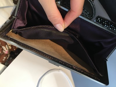 Lot 62 - A Chanel by Karl Lagerfeld purple suede evening clutch, early 2000s