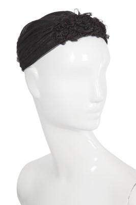 Lot 38 - A Chanel by Karl Lagerfeld blue and black tweed hat, 2010s