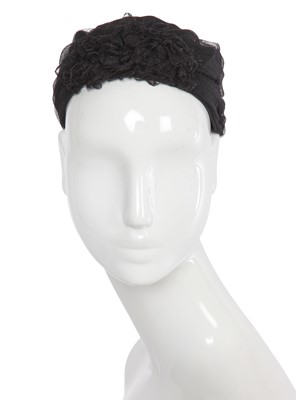 Lot 38 - A Chanel by Karl Lagerfeld blue and black tweed hat, 2010s