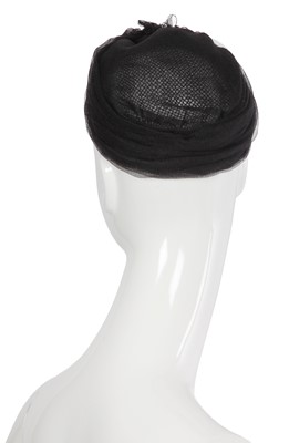Lot 38 - A Chanel by Karl Lagerfeld blue and black tweed hat, 2010s