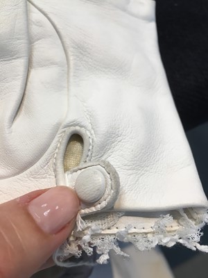 Lot 18 - A pair of Chanel haute couture by Karl Lagerfeld white tweed mitts, Spring-Summer 2014