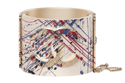 Lot 24 - A Chanel by Karl Lagerfeld 'paint-splatter' cuff, Autumn-Winter 2013-14