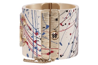 Lot 24 - A Chanel by Karl Lagerfeld 'paint-splatter' cuff, Autumn-Winter 2013-14