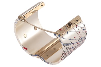 Lot 24 - A Chanel by Karl Lagerfeld 'paint-splatter' cuff, Autumn-Winter 2013-14