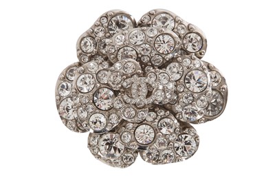 Lot 32 - A Chanel by Karl Lagerfeld rhinestone camellia brooch, 2011