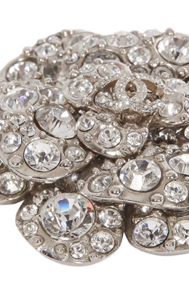 Lot 32 - A Chanel by Karl Lagerfeld rhinestone camellia brooch, 2011