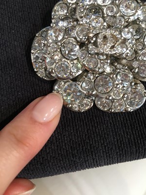 Lot 32 - A Chanel by Karl Lagerfeld rhinestone camellia brooch, 2011