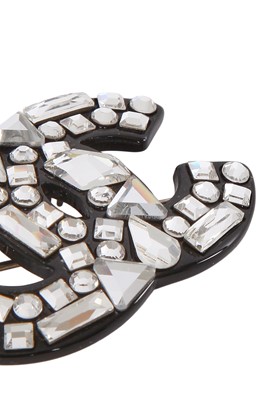 Lot 41 - A Chanel by Karl Lagerfeld 'CC' rhinestone-set brooch, 2010