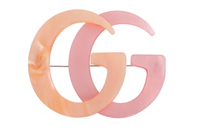Lot 98 - A Gucci pink and orange resin brooch, 2010s