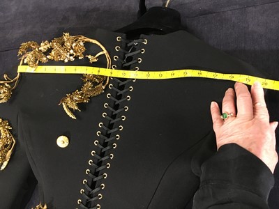 Lot 89 - A fine Schiaparelli haute couture by Daniel Roseberry embellished black wool coat-dress, Autumn-Winter 2022-23