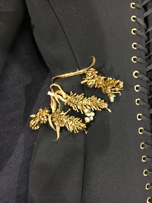 Lot 89 - A fine Schiaparelli haute couture by Daniel Roseberry embellished black wool coat-dress, Autumn-Winter 2022-23