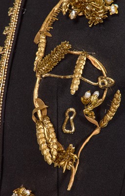 Lot 89 - A fine Schiaparelli haute couture by Daniel Roseberry embellished black wool coat-dress, Autumn-Winter 2022-23