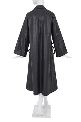 Lot 2 - A Comme des Garçons black polyurethane raincoat, 1970s