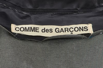 Lot 2 - A Comme des Garçons black polyurethane raincoat, 1970s