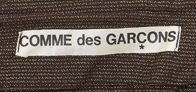 Lot 8 - A Comme des Garçons black and gold dress, 1970s