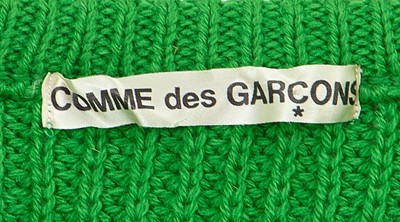 Lot 24 - A Comme des Garçons knitted green wool sweater, early 1980s