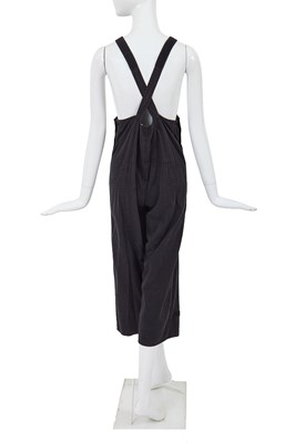 Lot 34 - A pair of Comme des Garçons black cotton dungarees, circa 1981