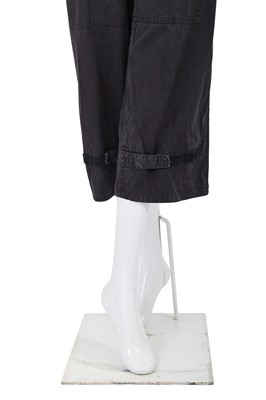 Lot 34 - A pair of Comme des Garçons black cotton dungarees, circa 1981