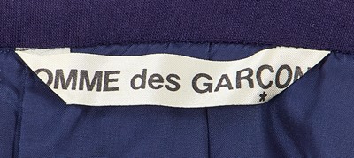 Lot 51 - A Comme des Garçons navy wool jersey pinafore skirt, circa 1982