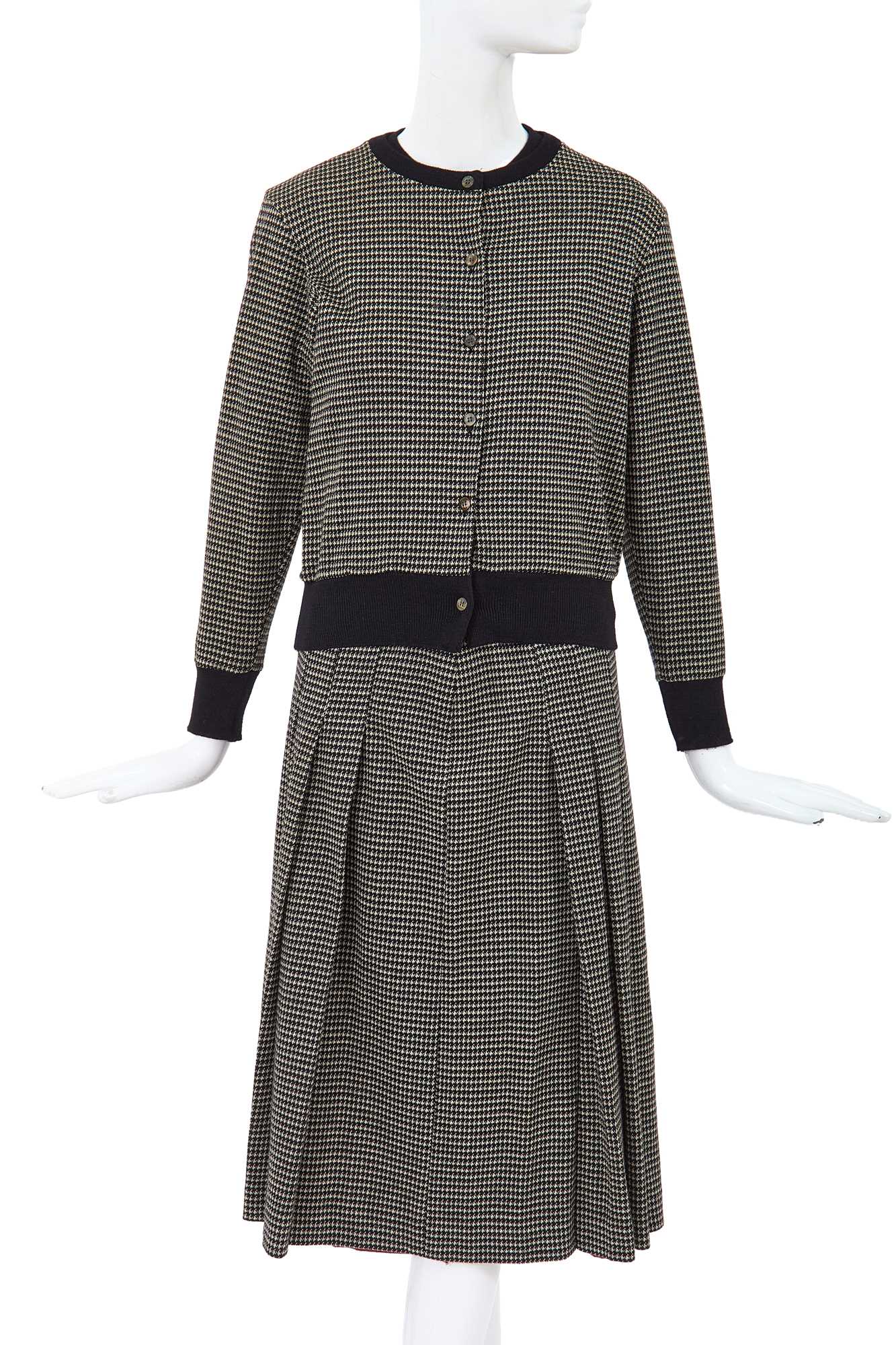 Lot 23 - A Comme des Garçons black and white knitted three-piece ensemble, circa 1980
