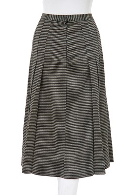 Lot 23 - A Comme des Garçons black and white knitted three-piece ensemble, circa 1980