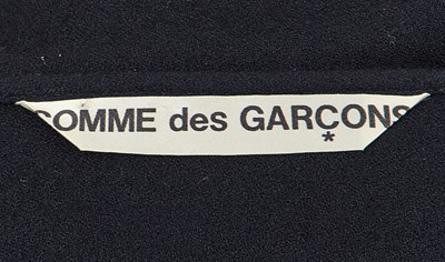 Lot 43 - A Comme des Garçons black wool crêpe coat, probably ‘Pirates’ collection, Autumn-Winter 1981-82