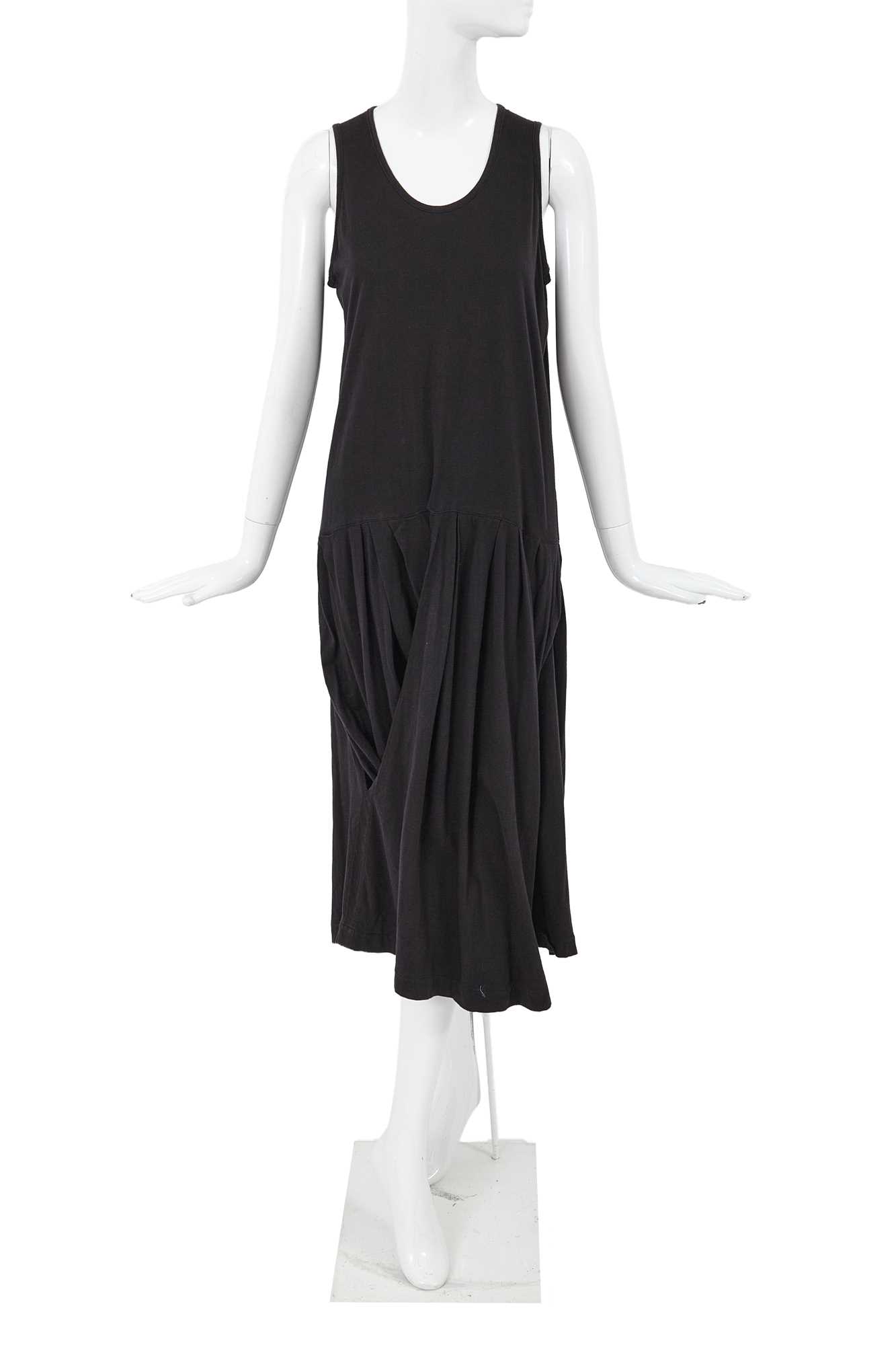 Lot 87 - A Comme des Garçons black cotton jersey dress, probably ‘Round Rubber’ collection, Spring-Summer 1984
