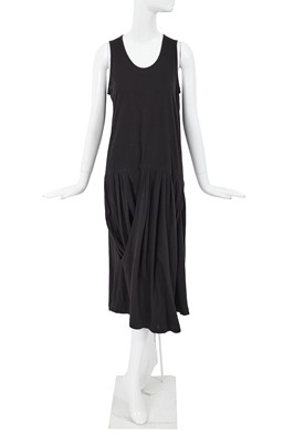 Lot 87 - A Comme des Garçons black cotton jersey dress, probably ‘Round Rubber’ collection, Spring-Summer 1984