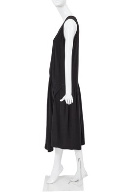 Lot 87 - A Comme des Garçons black cotton jersey dress, probably ‘Round Rubber’ collection, Spring-Summer 1984