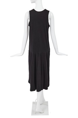 Lot 87 - A Comme des Garçons black cotton jersey dress, probably ‘Round Rubber’ collection, Spring-Summer 1984