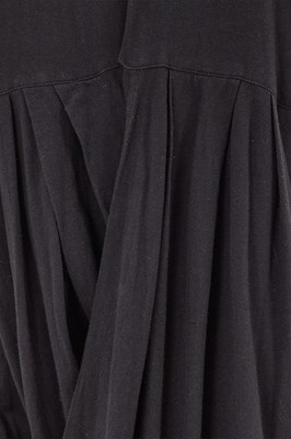Lot 87 - A Comme des Garçons black cotton jersey dress, probably ‘Round Rubber’ collection, Spring-Summer 1984