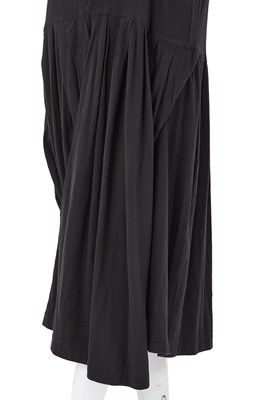 Lot 87 - A Comme des Garçons black cotton jersey dress, probably ‘Round Rubber’ collection, Spring-Summer 1984
