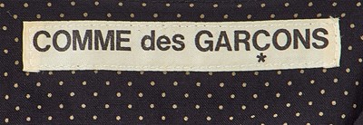 Lot 53 - A Comme des Garçons black and grey spotted wool dress, circa 1982