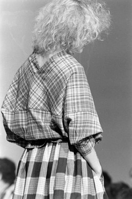 Lot 61 - A Comme des Garçons red and white tartan wool top, ‘Holes’ collection, Autumn-Winter 1982-83