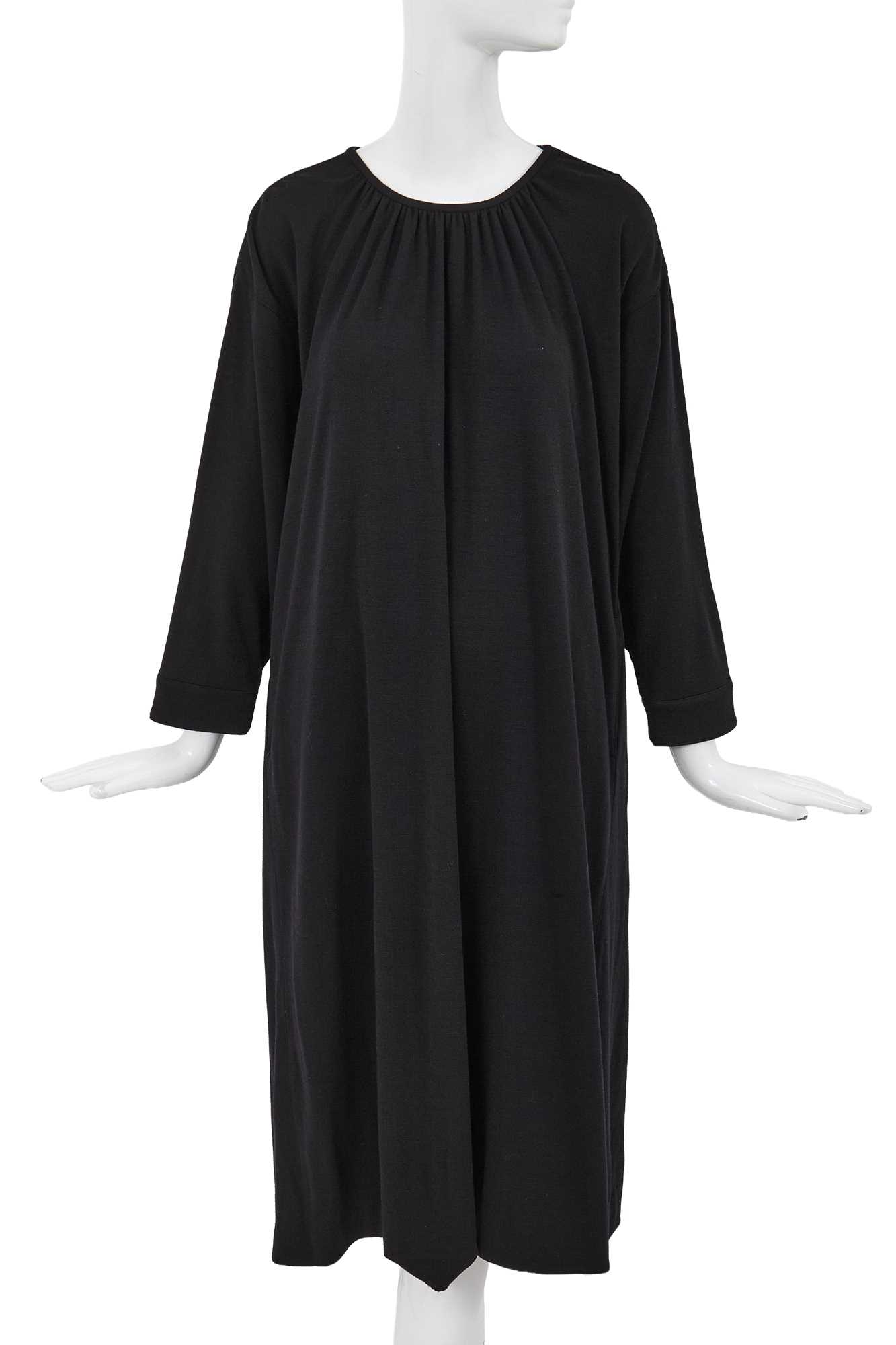 Lot 64 - A Comme des Garçons black wool dress, probably ‘Holes’ collection, Autumn-Winter 1982-83