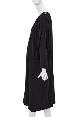 Lot 64 - A Comme des Garçons black wool dress, probably ‘Holes’ collection, Autumn-Winter 1982-83