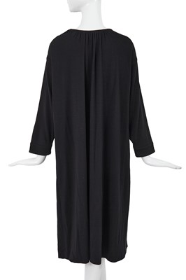 Lot 64 - A Comme des Garçons black wool dress, probably ‘Holes’ collection, Autumn-Winter 1982-83