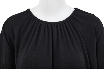 Lot 64 - A Comme des Garçons black wool dress, probably ‘Holes’ collection, Autumn-Winter 1982-83