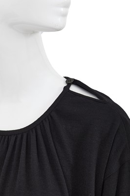 Lot 64 - A Comme des Garçons black wool dress, probably ‘Holes’ collection, Autumn-Winter 1982-83