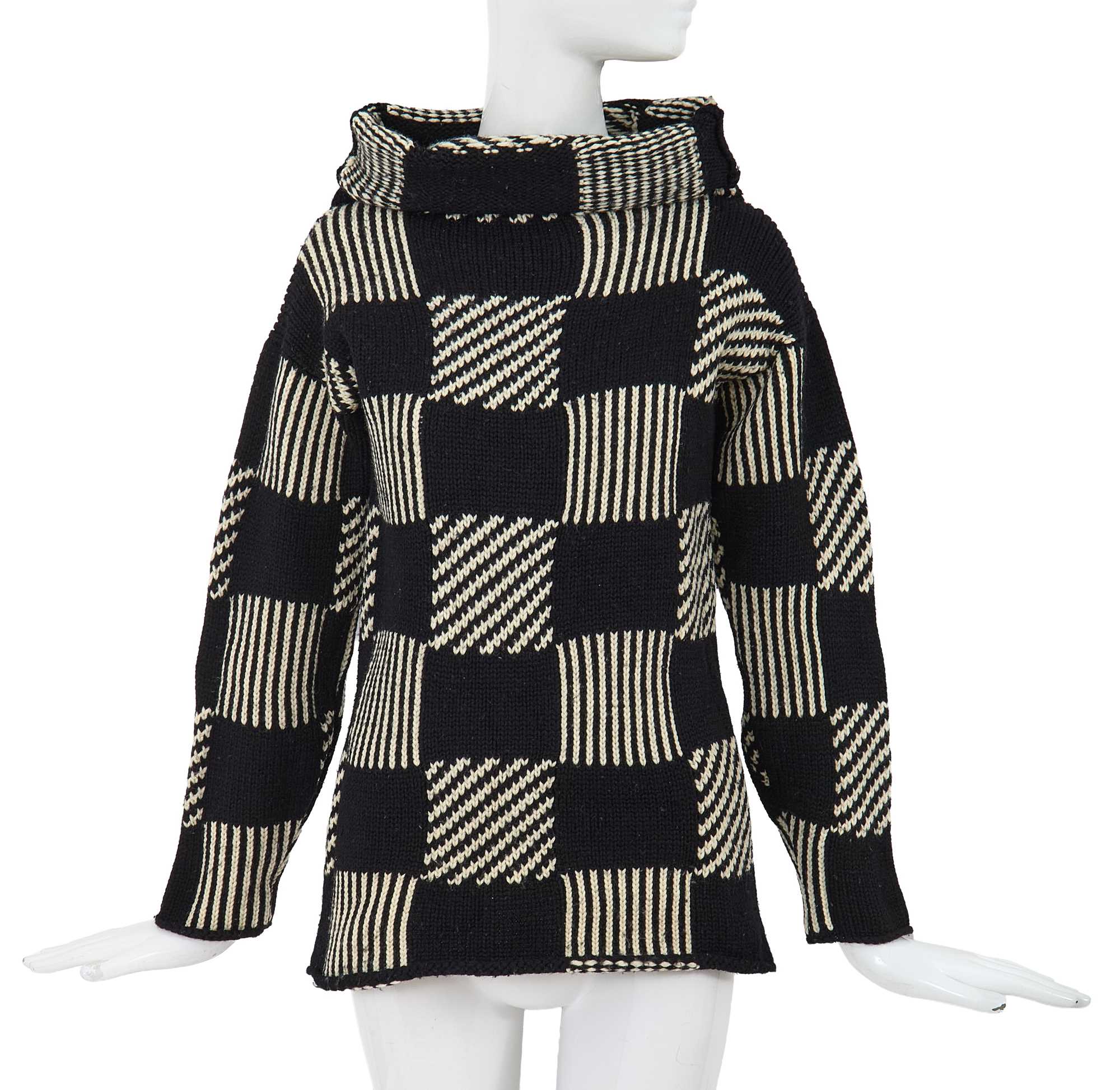 Lot 81 - A Comme des Garçons black and white wool sweater, probably ‘Gloves, Skirts, Quilted Big Coats’ collection, Autumn-Winter 1983-84
