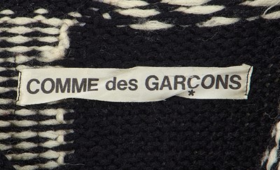 Lot 81 - A Comme des Garçons black and white wool sweater, probably ‘Gloves, Skirts, Quilted Big Coats’ collection, Autumn-Winter 1983-84