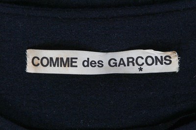 Lot 50 - A Comme des Garçons black wool dress, circa 1982