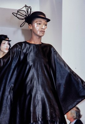 Lot 62 - A Comme des Garçons dark blue satin ensemble, ‘Holes’ collection, Autumn-Winter 1982-83