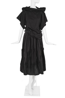 Lot 67 - A Comme des Garçons black cotton ensemble, ‘Patchworks and X’ collection, Spring-Summer 1983